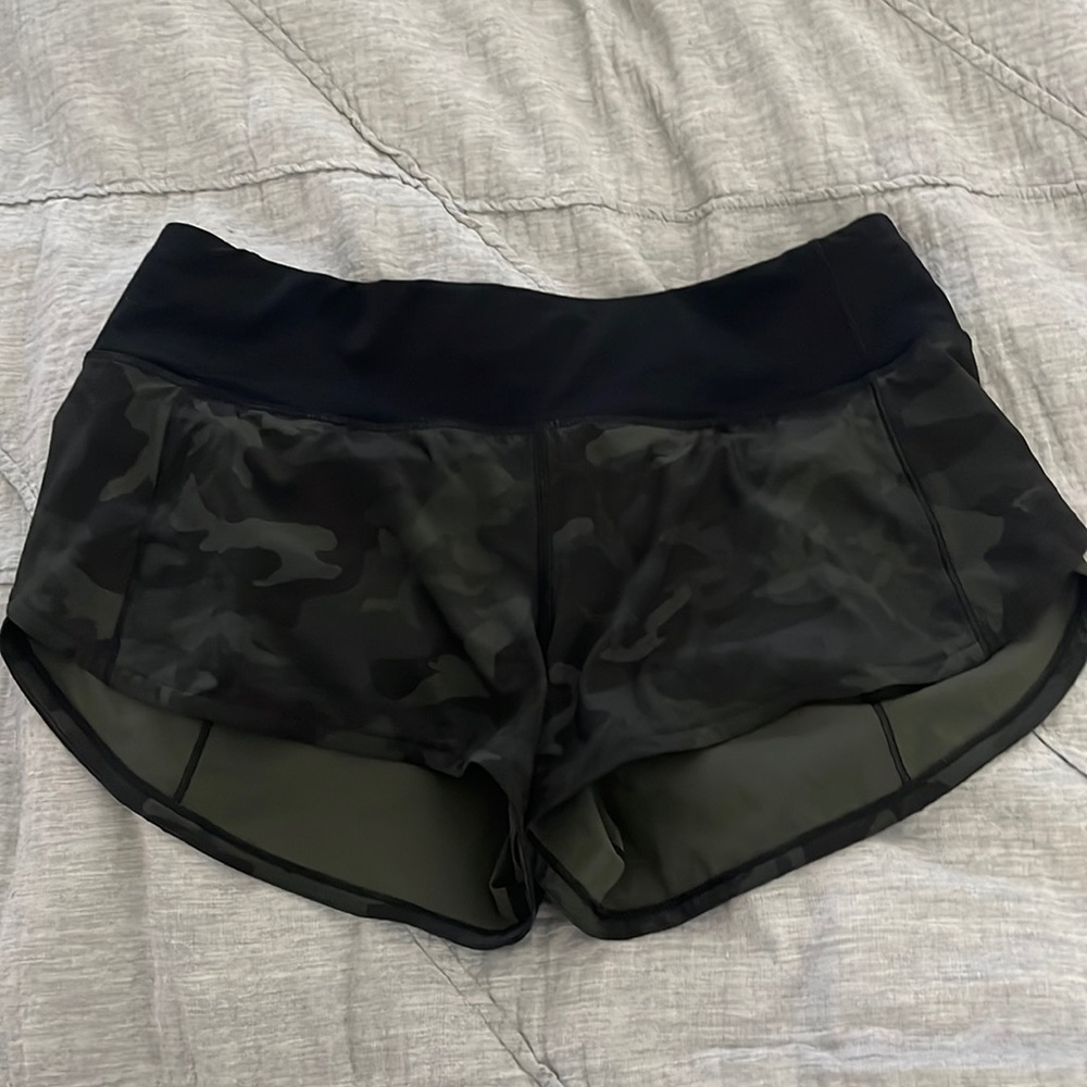 Never worn tags removed.  Hard to find lulu camo speedy shorts.